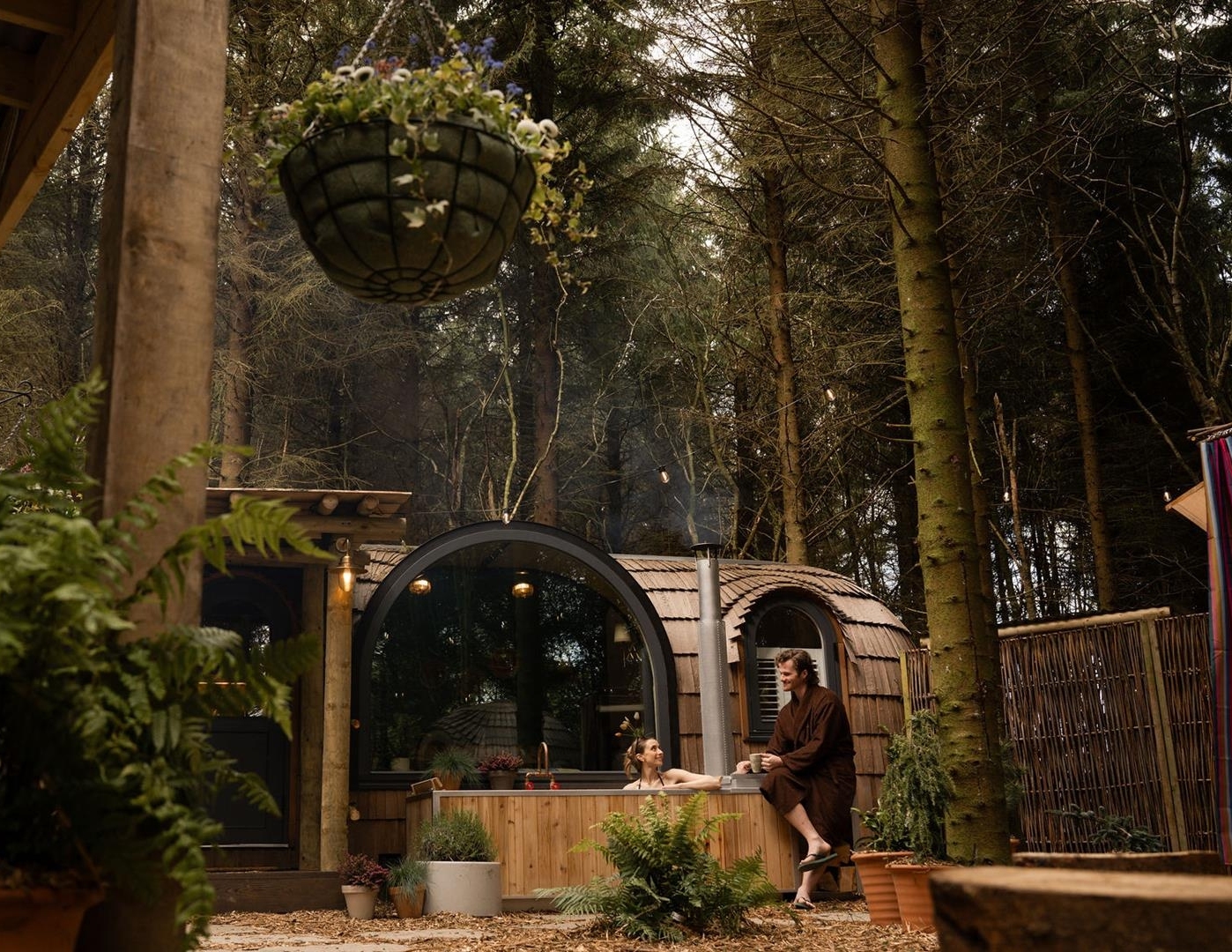 Couple in a shepherds hut at Galgorm Resort